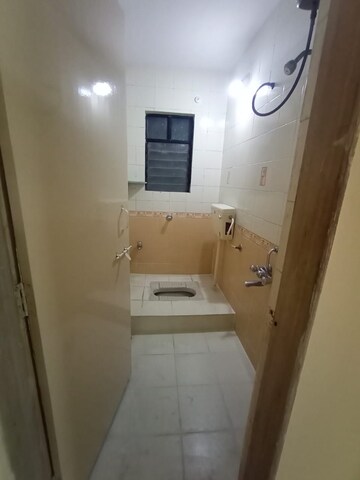 Bathroom in 2 BHK Apartment at Om Trimurti CHS, Dattawadi – for Rent