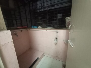 Bathroom in 2 BHK Apartment at Om Trimurti CHS, Dattawadi – for Rent