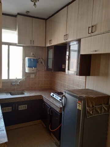 Kitchen in 2 BHK Apartment at Supertech Czar Suites, Omicron I Greater Noida – for Sale