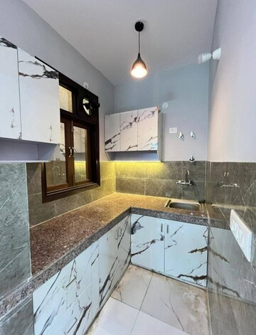 Kitchen in 2 BHK Apartment at Boutique Residential Apartments C-220, Malviya Nagar – for Rent