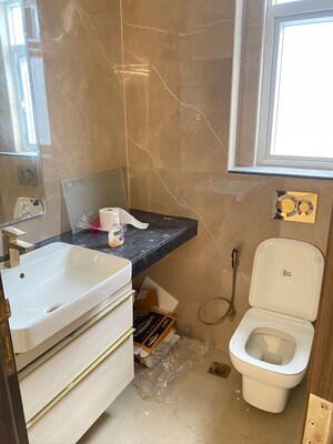 Bathroom in 3 BHK Apartment at Smart World Orchard, Sector 61 – for Sale