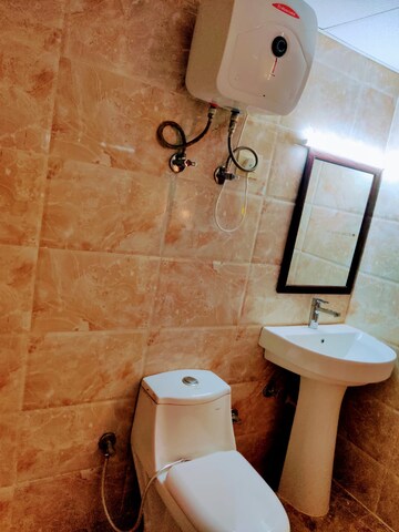 Bathroom in Studio Apartment at Supertech Czar Suites, Omicron I Greater Noida – for Rent