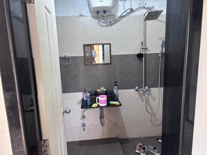 Bathroom in 1 BHK Apartment at Kamdhenu Jasmine CHS, Pimple Saudagar – for Sale