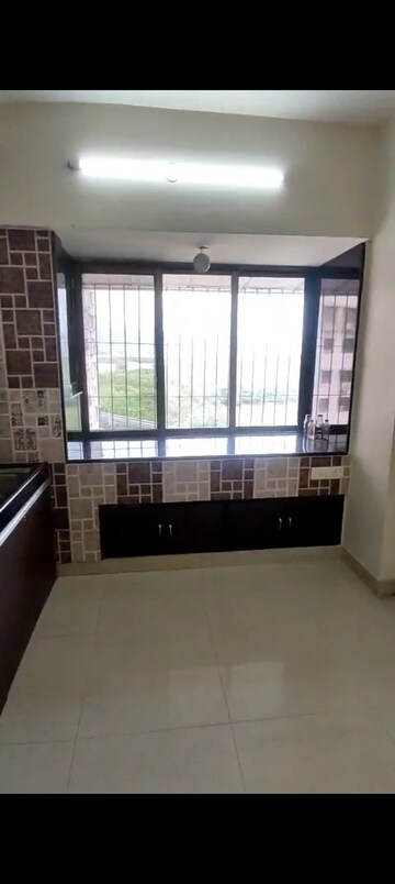Kitchen in 1 BHK Apartment at Ajmera Odyessey Apartment, Bhakti Park – for Rent