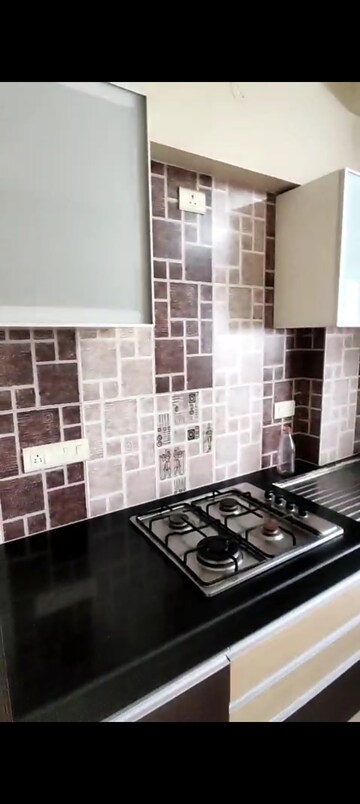 Kitchen in 1 BHK Apartment at Ajmera Odyessey Apartment, Bhakti Park – for Rent