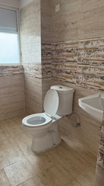 Bathroom in 3 BHK Apartment at Amrapali Golf Homes, Sector 4 Greater Noida – for Sale