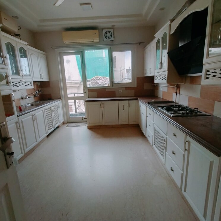 Kitchen, panchsheel park 4 Bedroom 800 Sq.Yd. Builder Floor In Panchsheel Park Delhi 9129242