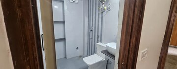 Bathroom in 3 BHK Apartment at Sector 6 Dwarka – for Rent