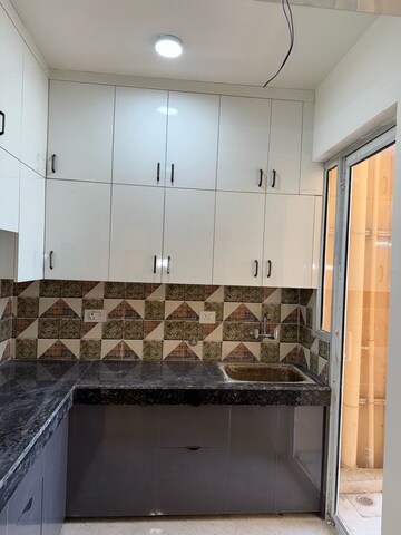 Kitchen in 2 BHK Apartment at MRG Bazaar 93, Sector 93 – for Rent
