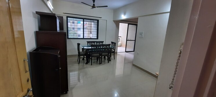 Living Room, magarpatta-city-iris 2 Bedroom 931 Sq.Ft. Apartment In Hadapsar Pune 9129279