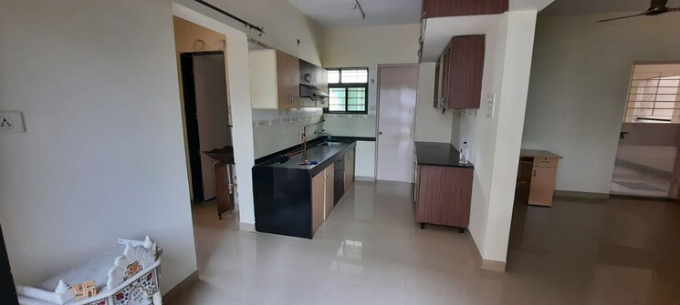 Kitchen, magarpatta-city-iris 2 Bedroom 931 Sq.Ft. Apartment In Hadapsar Pune 9129279