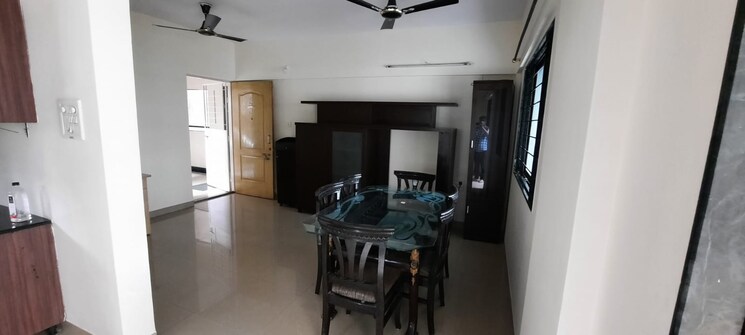 Living Room, magarpatta-city-iris 2 Bedroom 931 Sq.Ft. Apartment In Hadapsar Pune 9129279