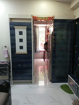 Building Lobby in 2 BHK Apartment at Veena Santoor, Borivali West – for Sale