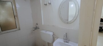 Bathroom in 3 BHK Apartment at Conscient Habitat 78, Sector 78 – for Rent