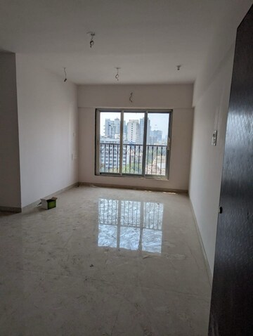 Room in 2 BHK Apartment at Ladiwala Bhavan, Kandivali West – for Sale