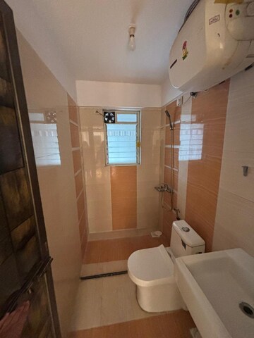 Bathroom in 3 BHK Apartment at Anmol Tower, Goregaon West – for Rent