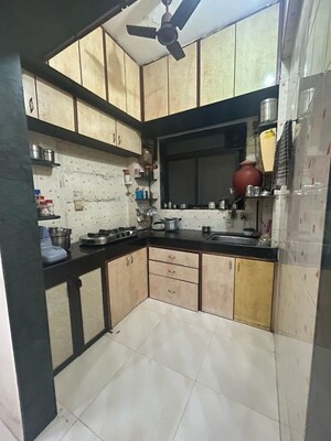Kitchen in 2 BHK Apartment at Veena Geet Sangeet, Kandivali West – for Sale