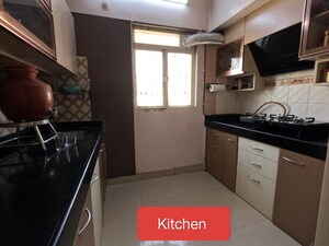 Kitchen in 1.5 BHK Apartment at Cosmos Heritage, Manpada – for Sale