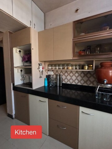 Kitchen in 1.5 BHK Apartment at Cosmos Heritage, Manpada – for Sale