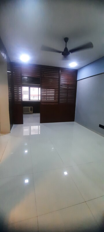 Living Room in 1 BHK Apartment at Queens View, Juhu – for Rent