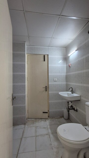 Bathroom in 3 BHK Apartment at Sector 49 – for Rent