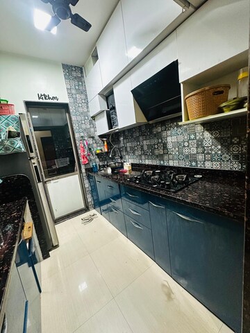 Kitchen in 2 BHK Apartment at Abrol Vastu Park, Malad West – for Sale