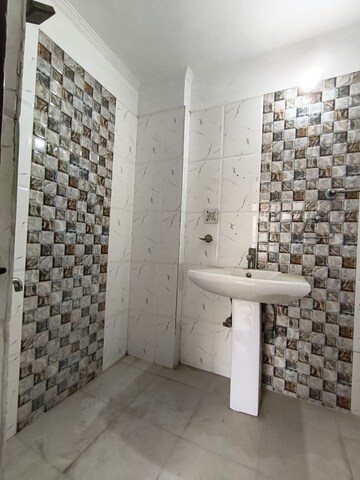 Bathroom in 3 BHK Apartment at The Mahesh CGHS, Sector 21c – for Sale