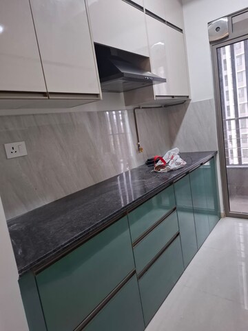 Kitchen in 2 BHK Apartment at Kalpataru Paramount, Kapur Bawdi – for Rent