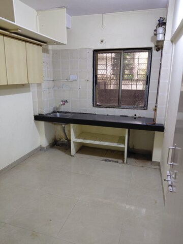 Kitchen in 1 BHK Apartment at Neel Laxmi CHS, Vile Parle East – for Rent