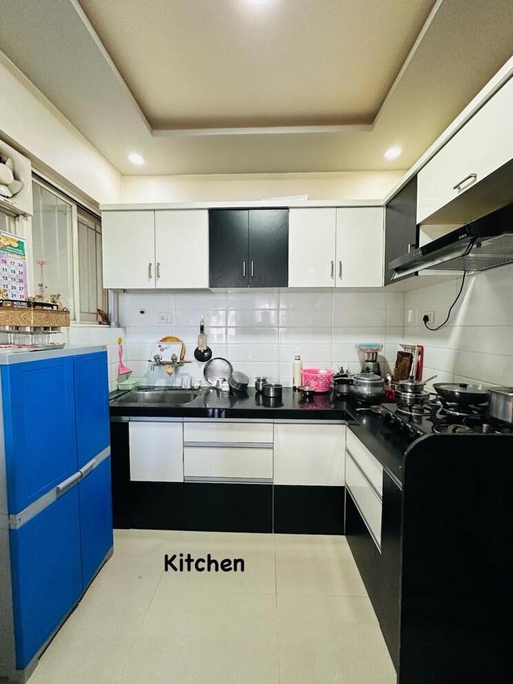 Kitchen, simpli-city 2 Bedroom 750 Sq.Ft. Apartment In Handewadi Pune 9130127