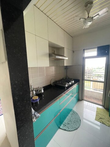 Kitchen in 1 BHK Apartment at JP North Imperia, Mira Road – for Sale