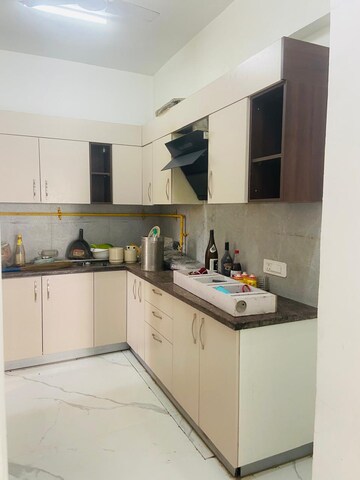 Kitchen in 2.5 BHK Apartment at Apex Alphabet, Tech Zone 4 Greater Noida – for Rent