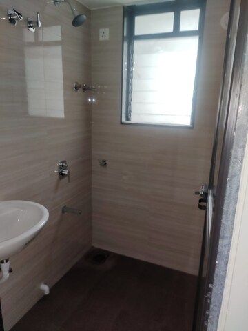 Bathroom in 1 BHK Apartment at Krishna Nagari CHS, Kalyan West – for Rent