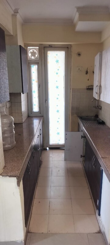 Kitchen in 2 BHK Apartment at Dwarkadhish Homes, Sector 84 – for Rent