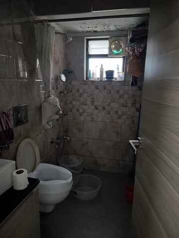 Bathroom in 1 BHK Apartment at Nutan Madhuban Apartment, Worli – for Rent