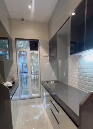 Kitchen in 3 BHK Apartment at Dhanlaxmi Dhananjay Hill View, Nalasopara West – for Sale