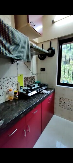 Kitchen in 2 BHK Apartment at Alfa Mana Residence, Mazgaon – for Sale