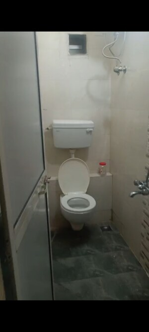 Bathroom in 1 BHK Apartment at Vadgama Kings Tower, Agripada – for Sale