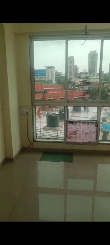 Kitchen in 1 BHK Apartment at Vadgama Kings Tower, Agripada – for Sale