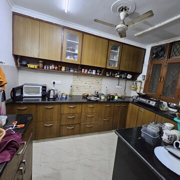 Kitchen in 4 BHK Apartment at Freedom Fighters Enclave – for Rent