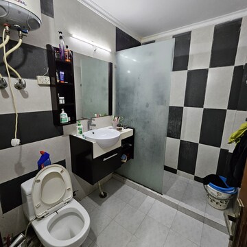 Bathroom in 4 BHK Apartment at Freedom Fighters Enclave – for Rent