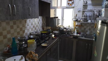 Kitchen in 2 BHK Apartment at Gaur City 5th Avenue, Sector 4 Greater Noida – for Rent