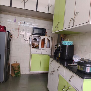 Kitchen in 2 BHK Apartment at Ganga Vihar Co-operative Housing Society, Raheja Twp – for Rent