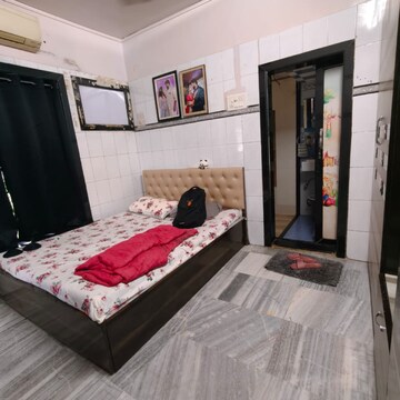 Bedroom in 2 BHK Apartment at Ganga Vihar Co-operative Housing Society, Raheja Twp – for Rent