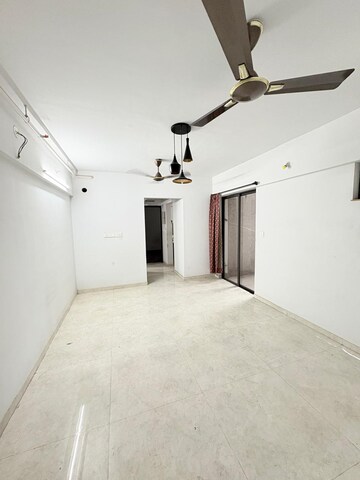 Living Room in 1 BHK Apartment at Lodha Lakeshore Greens, Dombivli East – for Rent