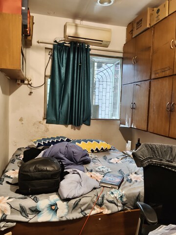 Living Room in 1 BHK Apartment at Florence CHS, Santacruz East – for Sale