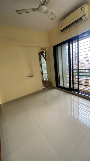 Room in 2 BHK Apartment at DB Orchid Suburbia, Kandivali West – for Rent