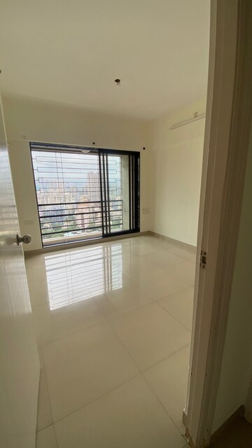 Room in 2 BHK Apartment at DB Orchid Suburbia, Kandivali West – for Rent