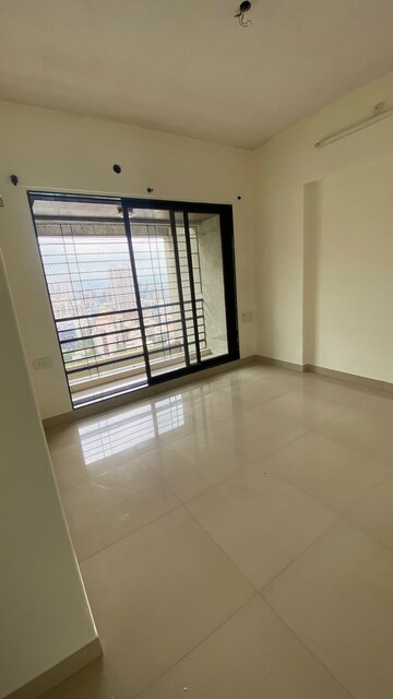 Room in 2 BHK Apartment at DB Orchid Suburbia, Kandivali West – for Rent