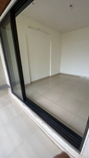 Room in 2 BHK Apartment at DB Orchid Suburbia, Kandivali West – for Rent